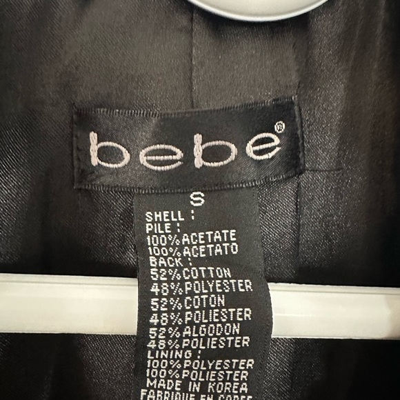 VINTAGE 90’s/Y2K faux Persian shearling BEBE 
Coat size Small
Satin lined 
EUC - Picture 11 of 14